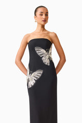 Brunette model wearing the Mira Strapless Gown in Black close up shot