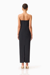 Brunette model wearing the Mira Strapless Gown in Black back shot