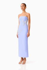 Brunette model wearing the Mira Strapless Gown in Blue side shot