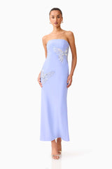 Brunette model wearing the Mira Strapless Gown in Blue posed shot