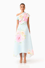 Brunette model wearing the Harper Asymmetrical Gown in Baby Blue Floral front shot 