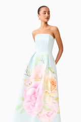 Brunette model wearing the Harper Strapless Gown in Baby Blue Floral close up looking away shot 