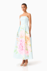 Brunette model wearing the Harper Strapless Gown in Baby Blue Floral side shot 