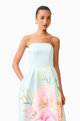Brunette model wearing the Harper Strapless Gown in Baby Blue Floral close up shot 