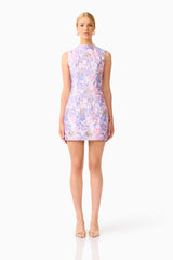 Blonde model wearing the Marlene Shift Mini Dress in Pink & Lilac Floral front shot