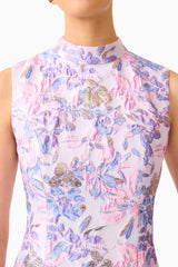 Blonde model wearing the Marlene Shift Mini Dress in Pink & Lilac Floral detail shot