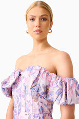 Blonde model wearing the Marlene Strapless Midi Dress in Pink & Purple Floral close up shot