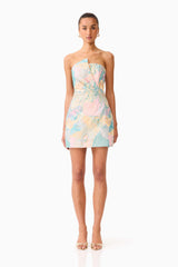 Brunette model wearing the Tahliah Strapless Mini Dress in Blue Multi front shot 