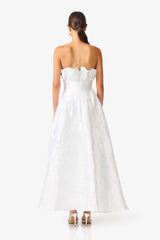 Brunette model wearing the Laurel Sleeveless Maxi Dress in Silver back shot