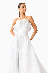 Brunette model wearing the Laurel Sleeveless Maxi Dress in Silver close up looking away shot
