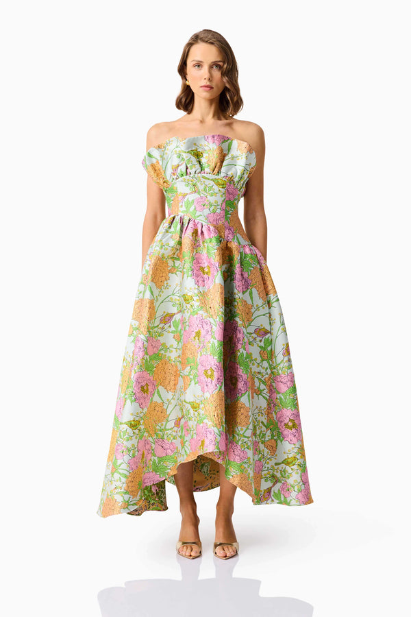 Brunette model wearing the Laurel Sleeveless Maxi Dress in Green Floral front shot