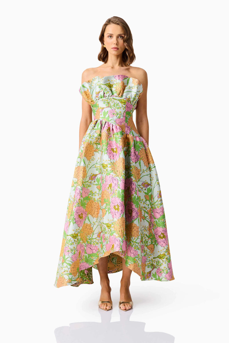 Brunette model wearing the Laurel Sleeveless Maxi Dress in Green Floral front shot
