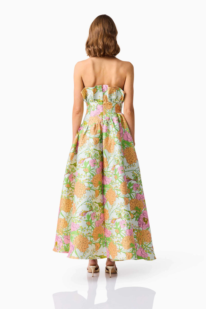Brunette model wearing the Laurel Sleeveless Maxi Dress in Green Floral back shot