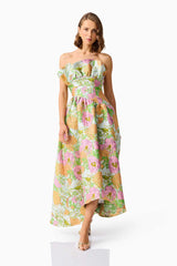 Brunette model wearing the Laurel Sleeveless Maxi Dress in Green Floral front walking shot
