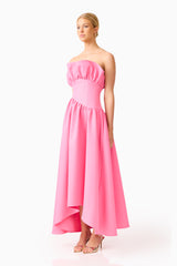 Blonde model wearing the Laurel Sleeveless Maxi Dress in Pink side shot