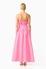 Blonde model wearing the Laurel Sleeveless Maxi Dress in Pink back shot