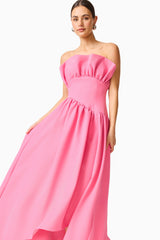 Blonde model wearing the Laurel Sleeveless Maxi Dress in Pink close up shot