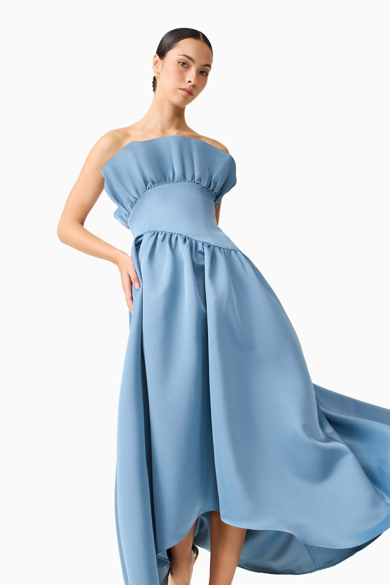 Brunette model wearing the Laurel Sleeveless Maxi Dress in Steel Blue posed shot 