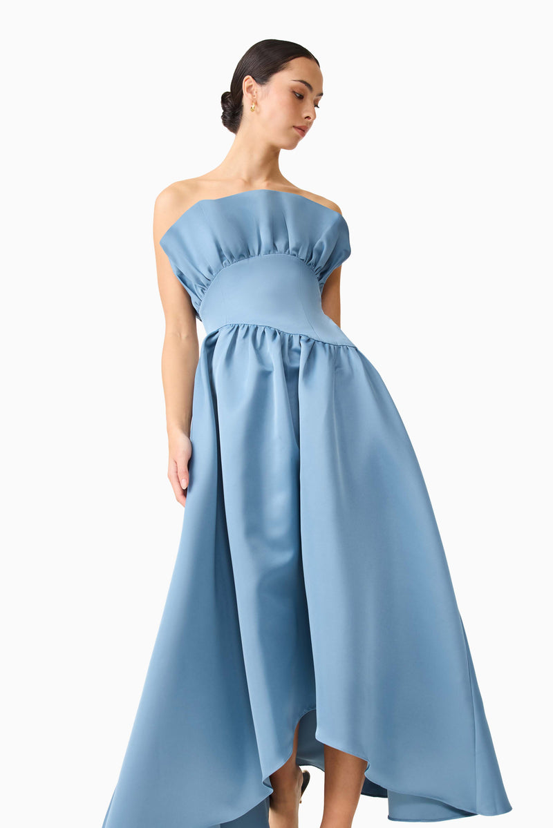 Brunette model wearing the Laurel Sleeveless Maxi Dress in Steel Blue close up looking away shot 