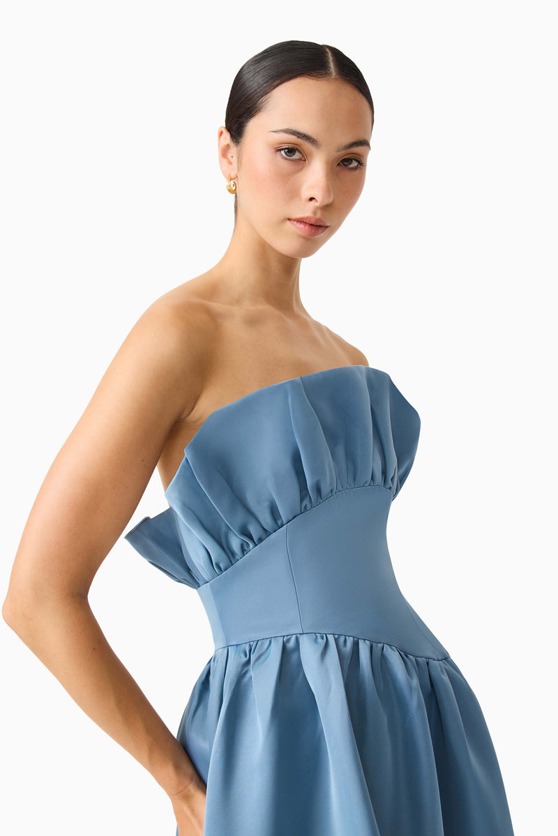 Brunette model wearing the Laurel Sleeveless Maxi Dress in Steel Blue close up shot 