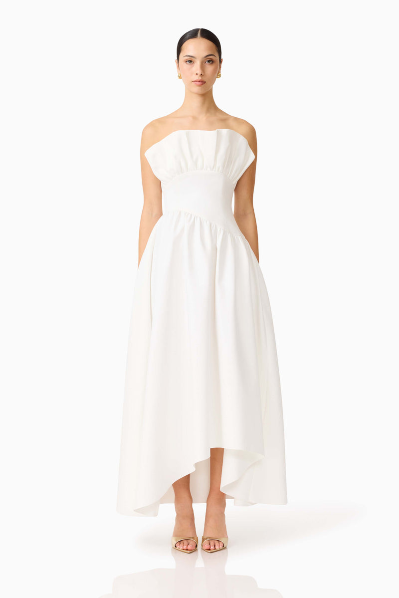 Brunette model wearing the Laurel Sleeveless Maxi Dress In White front shot 