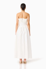 Brunette model wearing the Laurel Sleeveless Maxi Dress In White back shot 