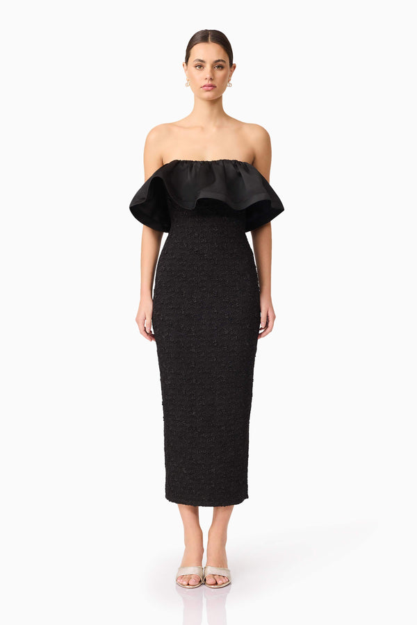 Brunette model wearing Dandelion Strapless Midi Dress in Black front shot
