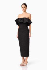 Brunette model wearing Dandelion Strapless Midi Dress in Black side shot