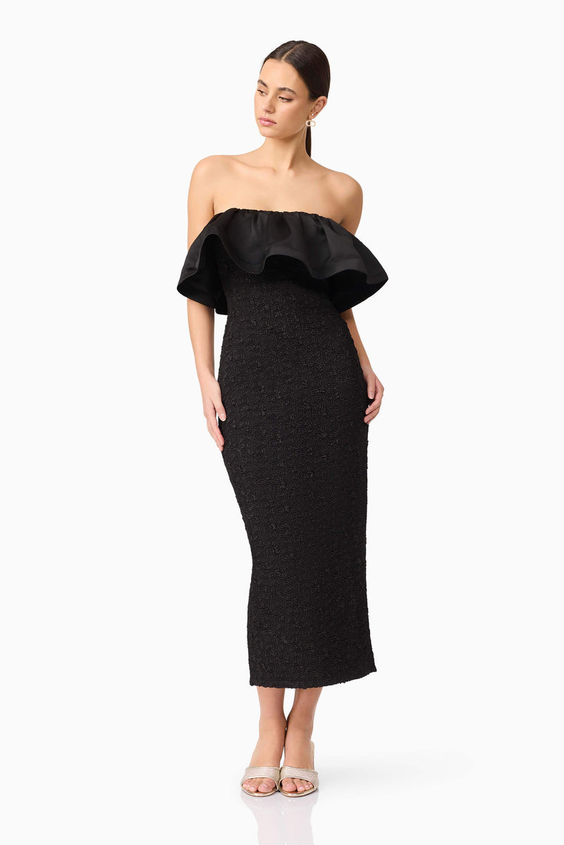 Brunette model wearing Dandelion Strapless Midi Dress in Black posed shot