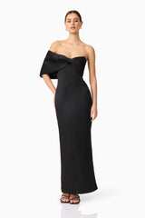 Brunette model wearing Dandelione Strapless Gown in Black posed shot