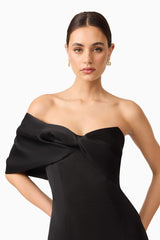 Brunette model wearing Dandelione Strapless Gown in Black close up shot