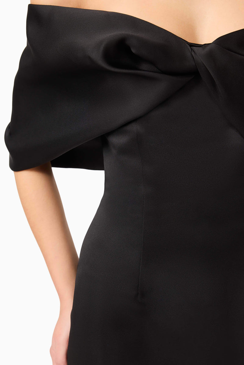 Brunette model wearing Dandelione Strapless Gown in Black detail shot