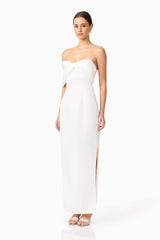 Brunette model wearing Dandelion Strapless Gown in White side shot