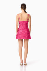 Brunette model wearing Claudia Party Dress in Pink back shot