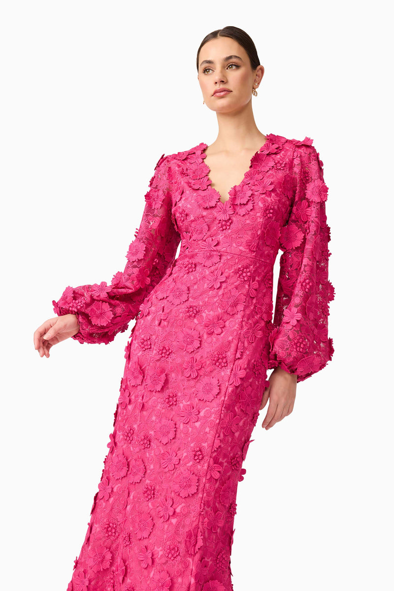 Brunette model wearing Claudia Long Sleeve Midi Dress in Pink close up posed shot