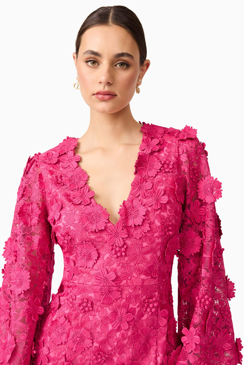 Brunette model wearing Claudia Long Sleeve Midi Dress in Pink close up shot