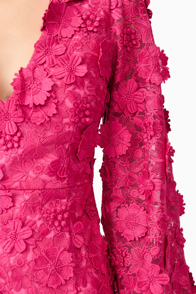 Brunette model wearing Claudia Long Sleeve Midi Dress in Pink detail shot