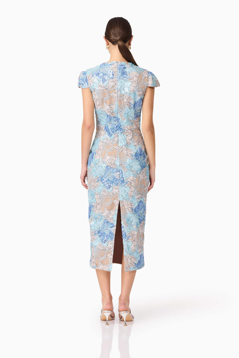 Brunette model wearing Leonie Sequin Midi Dress in Blue back shot