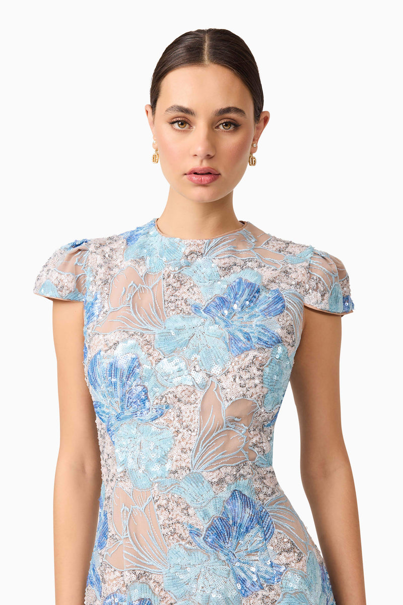 Brunette model wearing Leonie Sequin Midi Dress in Blue close up posed shot