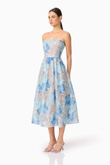 Brunette model wearing Leonie Cocktail Midi Dress in Blue side shot