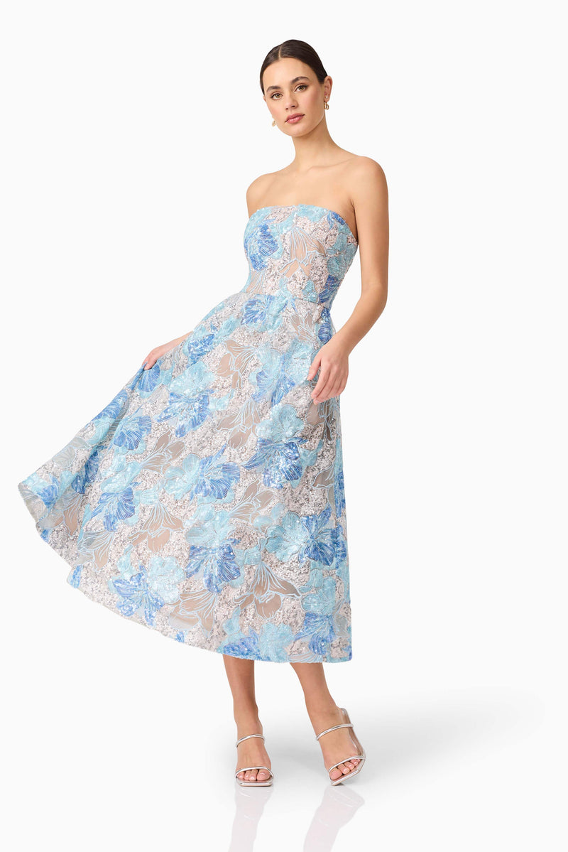 Brunette model wearing Leonie Cocktail Midi Dress in Blue posed shot