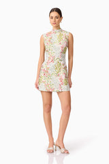 Brunette model in Calaantha Mini Dress in Floral front posing shot