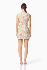 Brunette model in Calaantha Mini Dress in Floral back shot