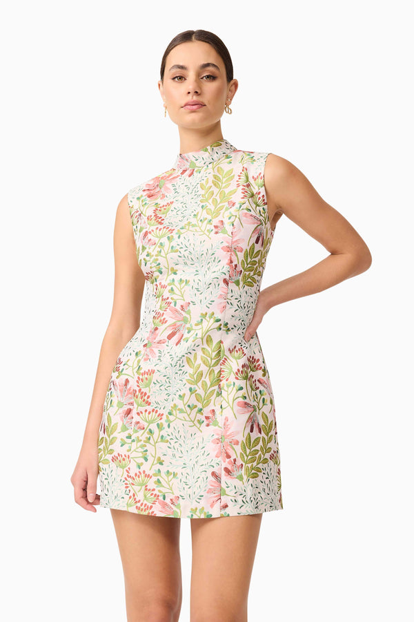 Brunette model in Calaantha Mini Dress in Floral close posing shot