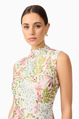 Brunette model in Calaantha Mini Dress in Floral pose close up shot