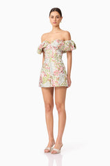 Brunette model in Calaantha Off The Shoulder Romper in Floral side view