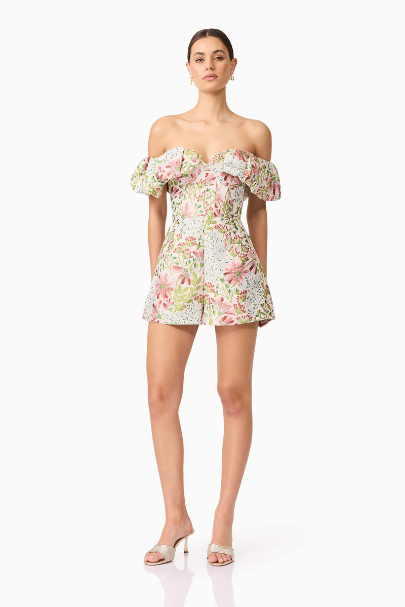 Brunette model in Calaantha Off The Shoulder Romper in Floral posing view
