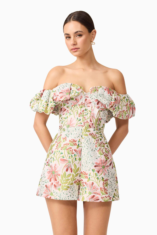 Brunette model in Calaantha Off The Shoulder Romper in Floral  close posing view