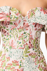 Brunette model in Calaantha Off The Shoulder Romper in Floral detail shot