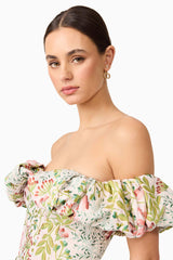 Brunette model wearing Calaantha Off The Shoulder Midi Dress in Floral close up shot